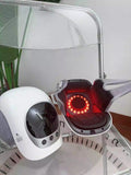 Kneepeak Smart Knee Massager with heat therapy and vibration massage, featuring red LED lights and adjustable straps.