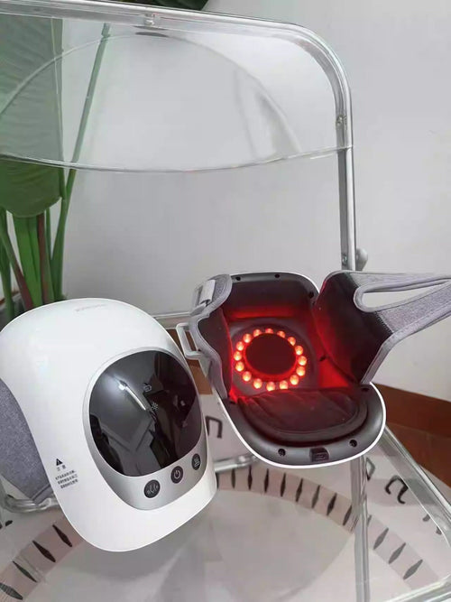 Kneepeak Smart Knee Massager with heat therapy and vibration massage, featuring red LED lights and adjustable straps.
